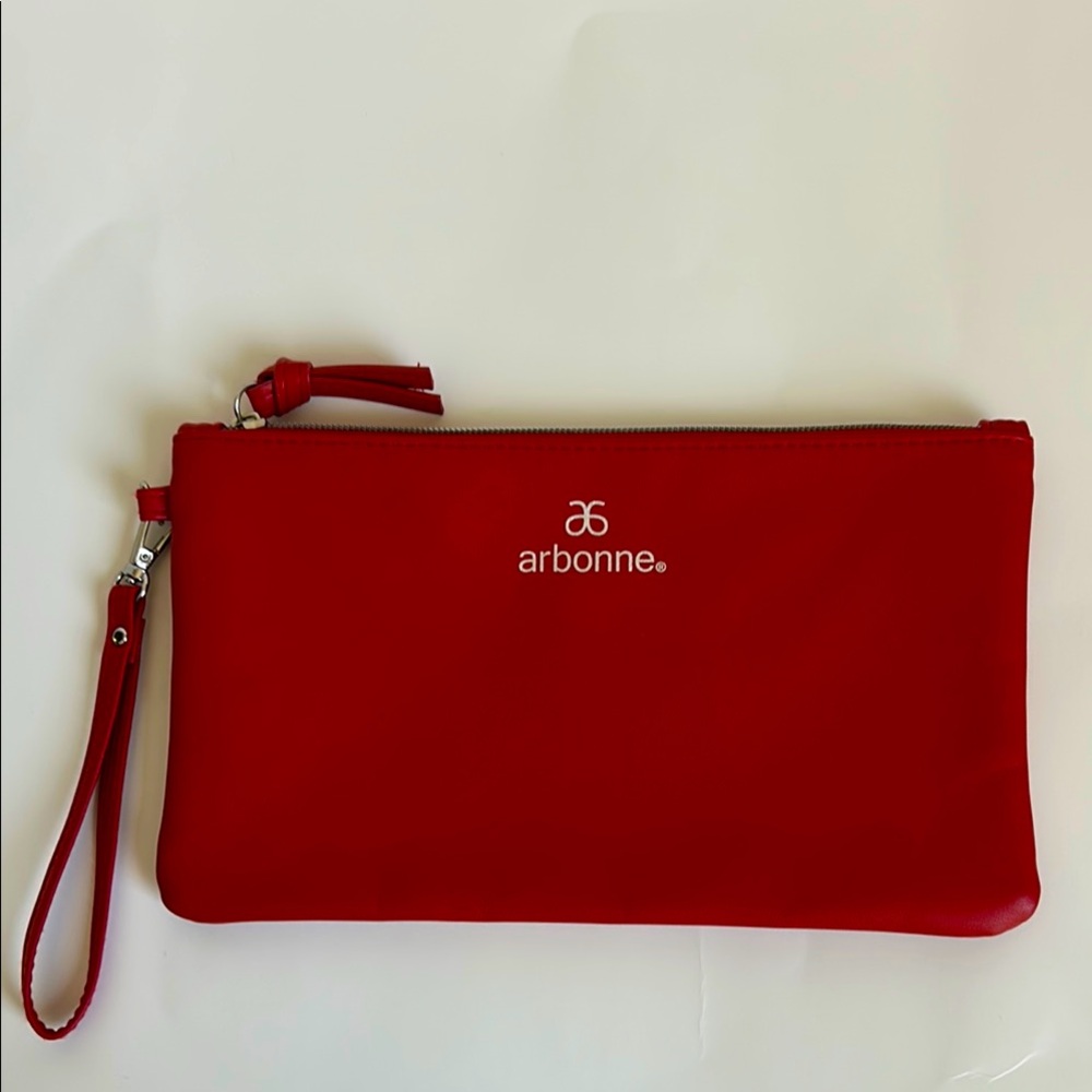 Arbonne red wristlet.